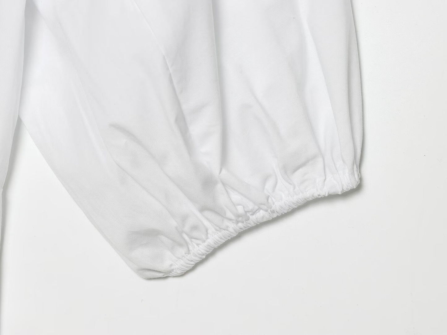 Women's skirt style hem bubble sleeve shirt
