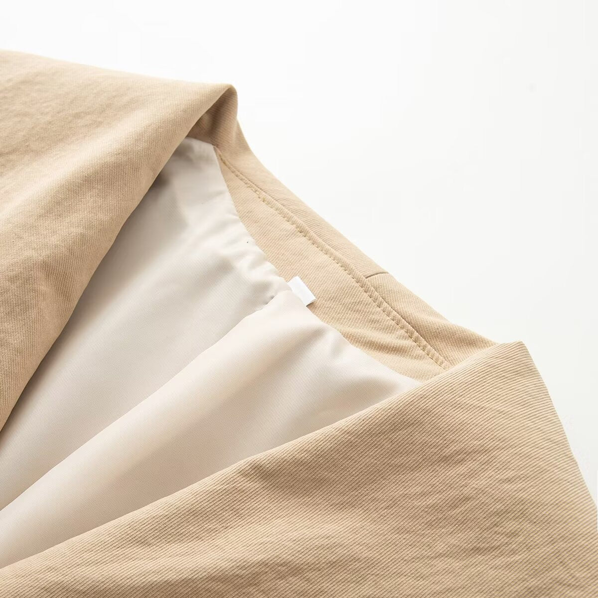 Women's long sleeved lapel short Coat