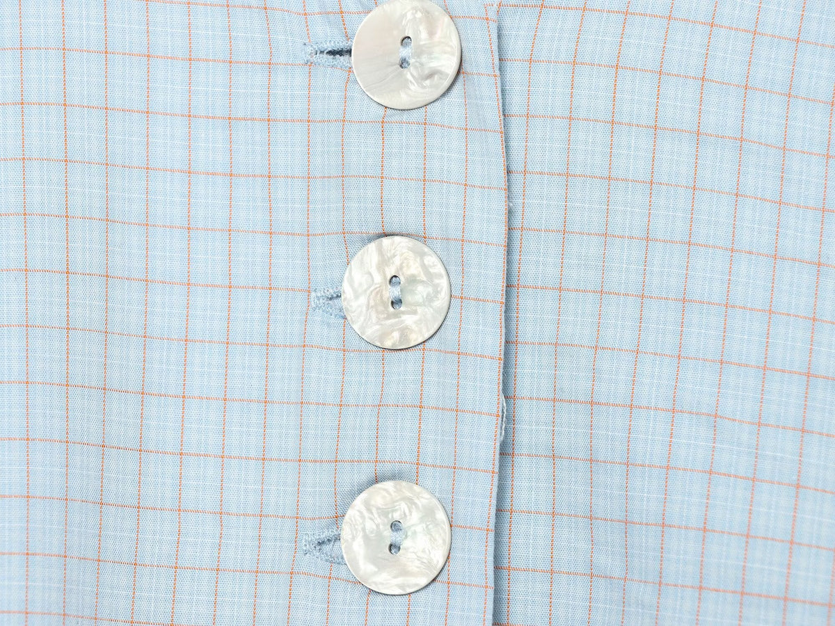 Women's short skirt style hem plaid top